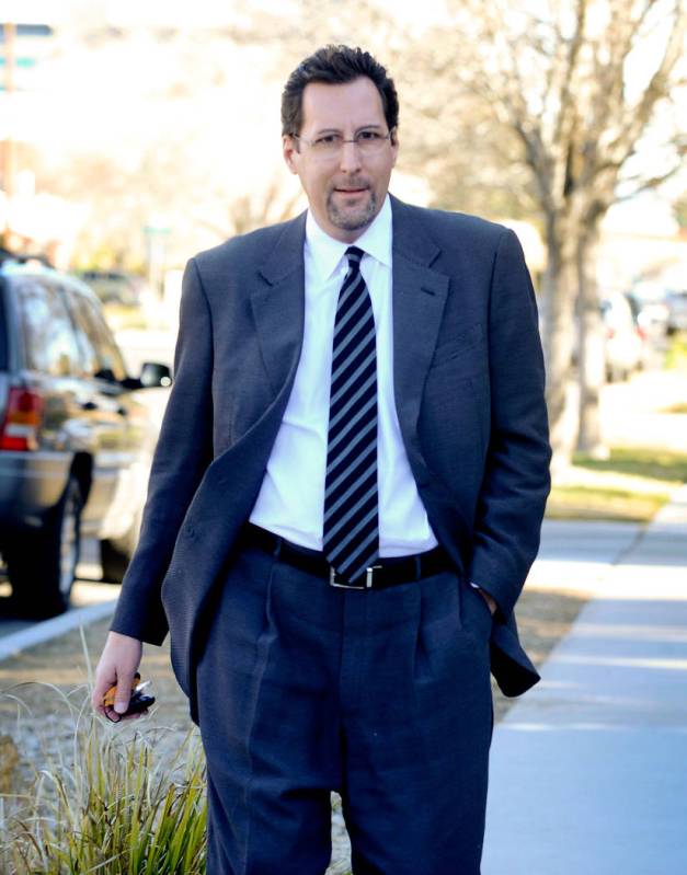 Developer Chris Milam arrives at a law office in Las Vegas to give a sworn statement on Feb. 22 ...