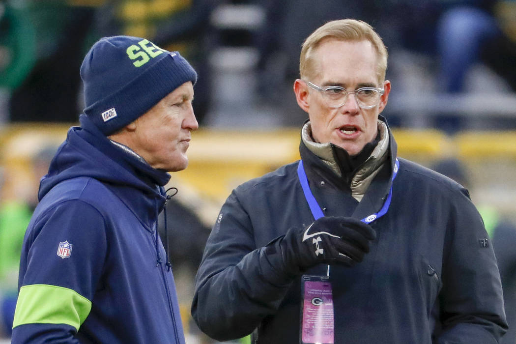 Fox TV's Joe Buck talks to Seattle Seahawks head coach Pete Carroll before an NFL divisional pl ...
