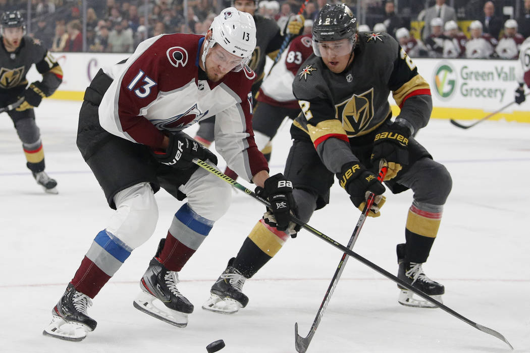 Colorado Avalanche right wing Valeri Nichushkin (13) and Vegas Golden Knights defenseman Zach W ...