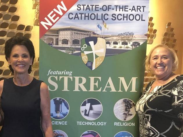 From left, Cathy Thompson, superintendent of schools for the Roman Catholic Diocese of Las Vega ...