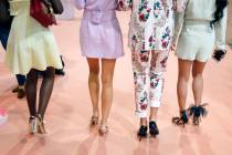 Influencers walk the show floor during the first day of the MAGIC trade show at the Las Vegas C ...