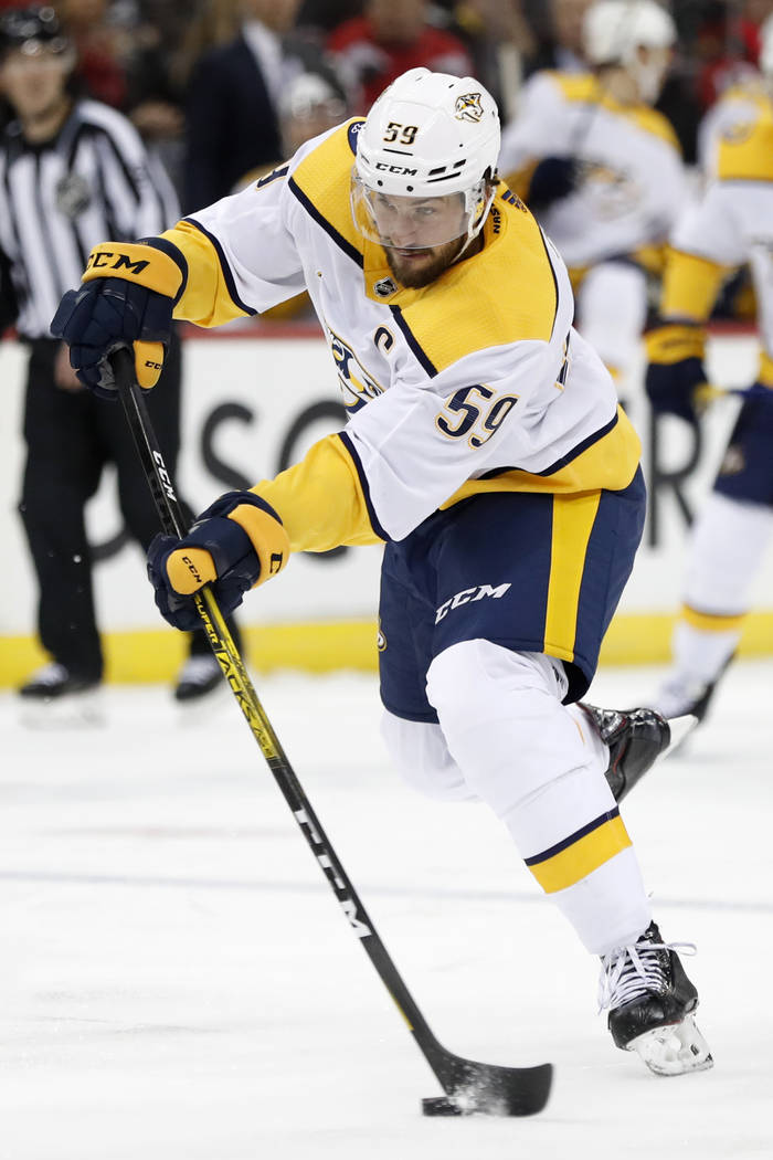 Nashville Predators defenseman Roman Josi (59), of Switzerland, shoots during the first period ...