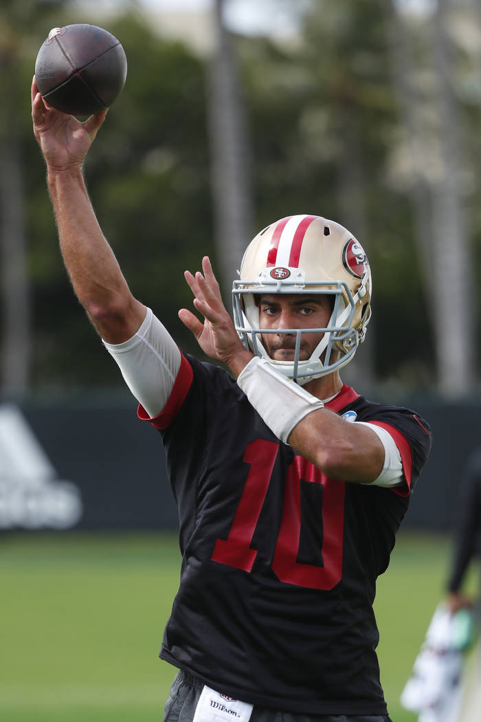 San Francisco 49ers quarterback Jimmy Garoppolo throws during practice for the NFL Super Bowl 5 ...