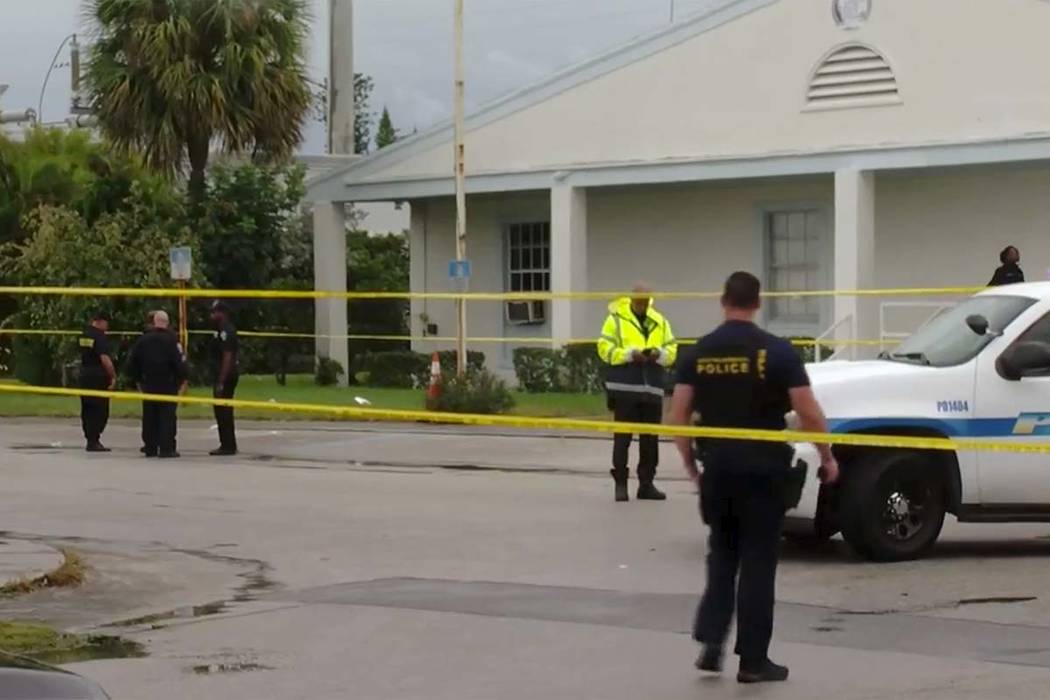This still image taken from video provided by WPEC CBS 12 News shows emergency responders at th ...