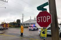 Law enforcement officials stand guard outside the Victory City Church in Riviera Beach, Fla., o ...