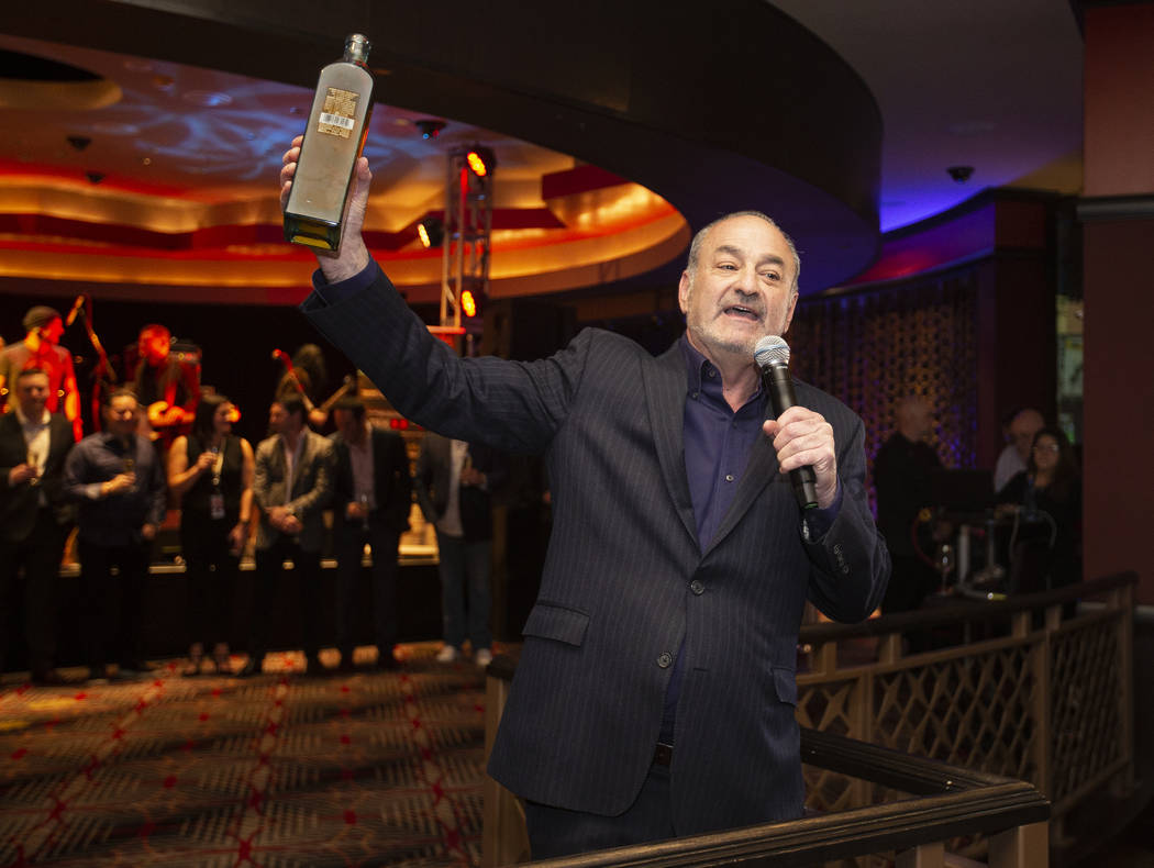 Hard Rock Hotel CEO Richard “Boz” Bosworth toasts the crowd during an event to sa ...