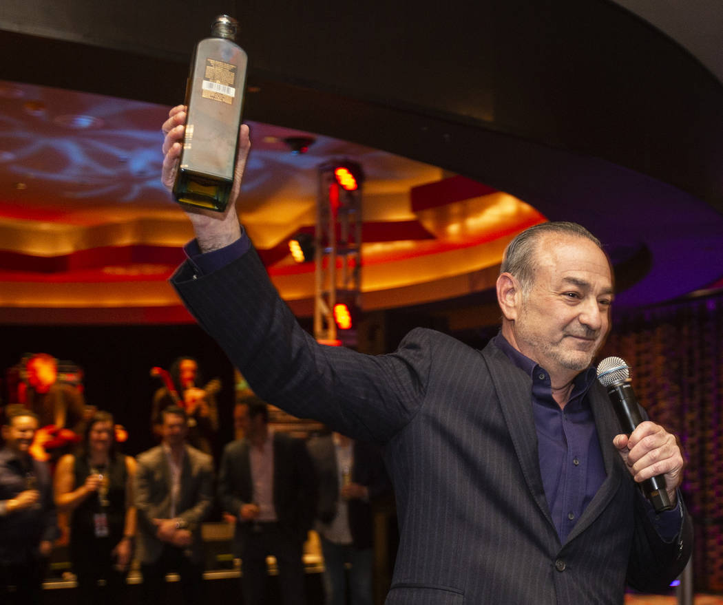 Hard Rock Hotel CEO Richard “Boz” Bosworth toasts the crowd during an event to say goodbye ...