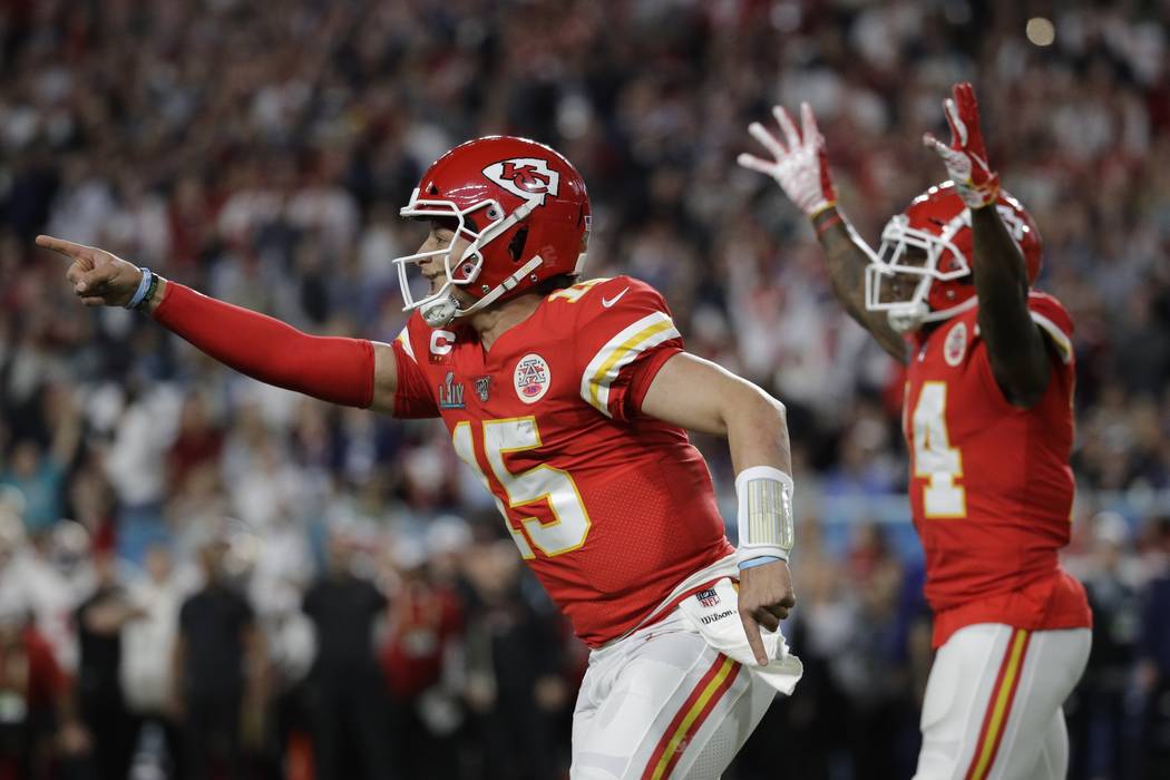 Kansas City Chiefs quarterback Patrick Mahomes (15) celebrates a play the San Francisco 49ers d ...