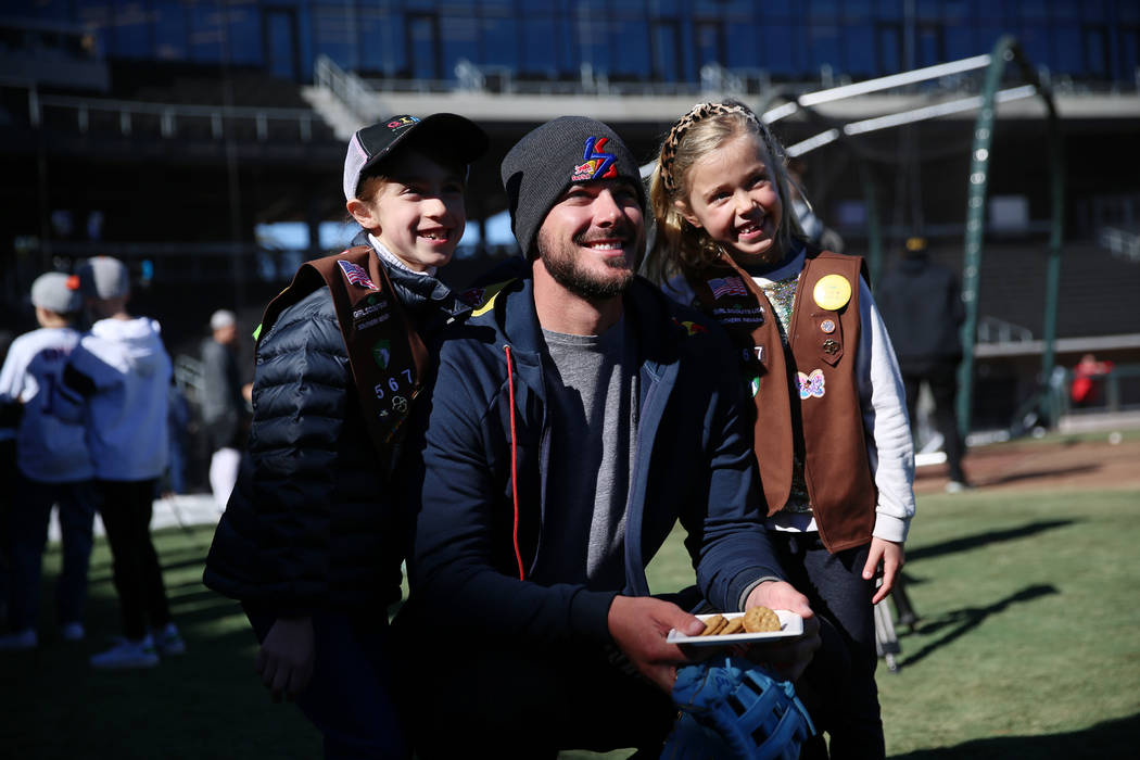 Chicago Cubs player Kris Bryant meets 7-year-olds Audrey Neal, left, and Audrey Shaw, of the Gi ...