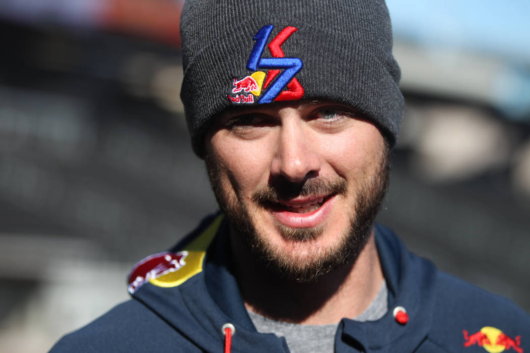 Chicago Cubs player Kris Bryant holds is interviewed during a live batting practice event at La ...