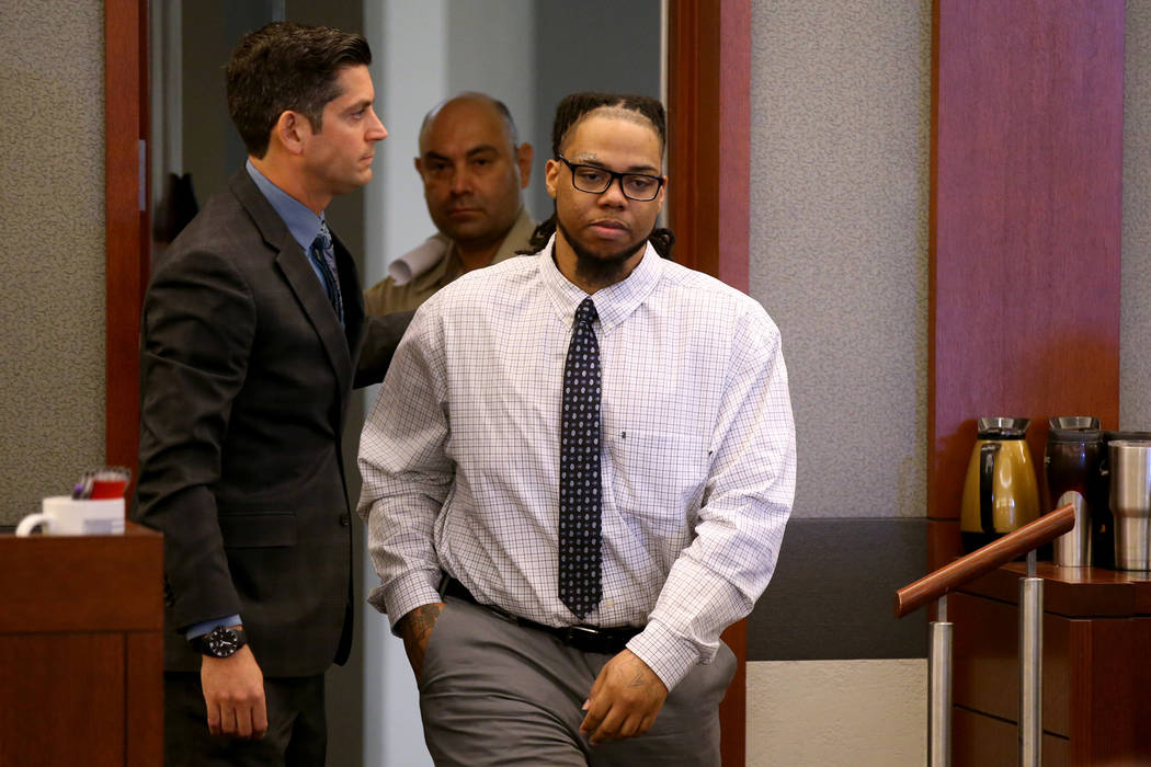 Ray Charles Brown, right, arrives in the courtroom with one of his attorneys, Richard Tanasi, b ...