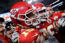 Kansas City Chiefs quarterback Patrick Mahomes (15) celebrates after the NFL Super Bowl 54 foot ...
