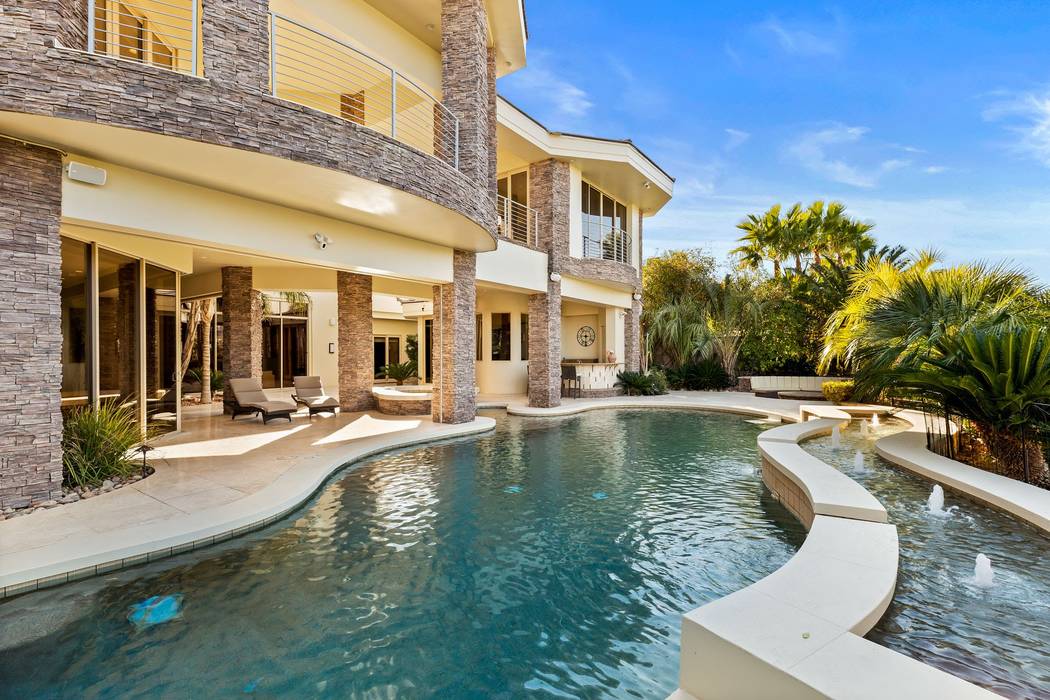 The resort-like backyard has a salt-water pool. (Ivan Sher Group)