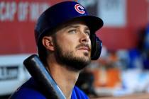 FILE - In this Aug. 10, 2019, file photo, Chicago Cubs' Kris Bryant (17) sits in the dugout dur ...
