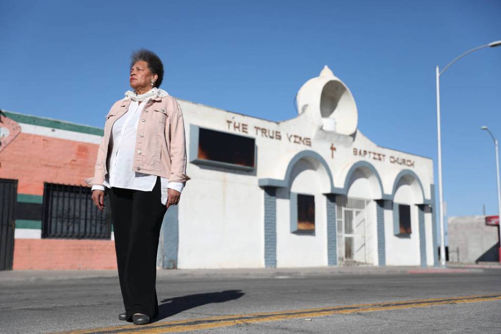 Jackie Brantley, who grew up blocks away from Jackson Street in West Las Vegas, stands in front ...