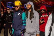 San Francisco 49ers' Fred Warner, from left, Richard Sherman and Jacob Thieneman are shown at T ...