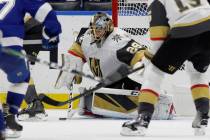 Vegas Golden Knights goaltender Marc-Andre Fleury (29) makes a save against the Tampa Bay Light ...