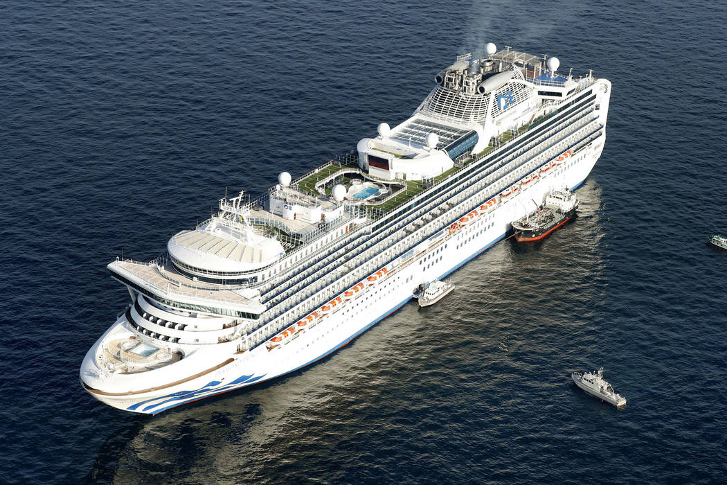 Cruise ship Diamond Princess is anchored off the shore of Yokohama, south of Tokyo, Wednesday, ...