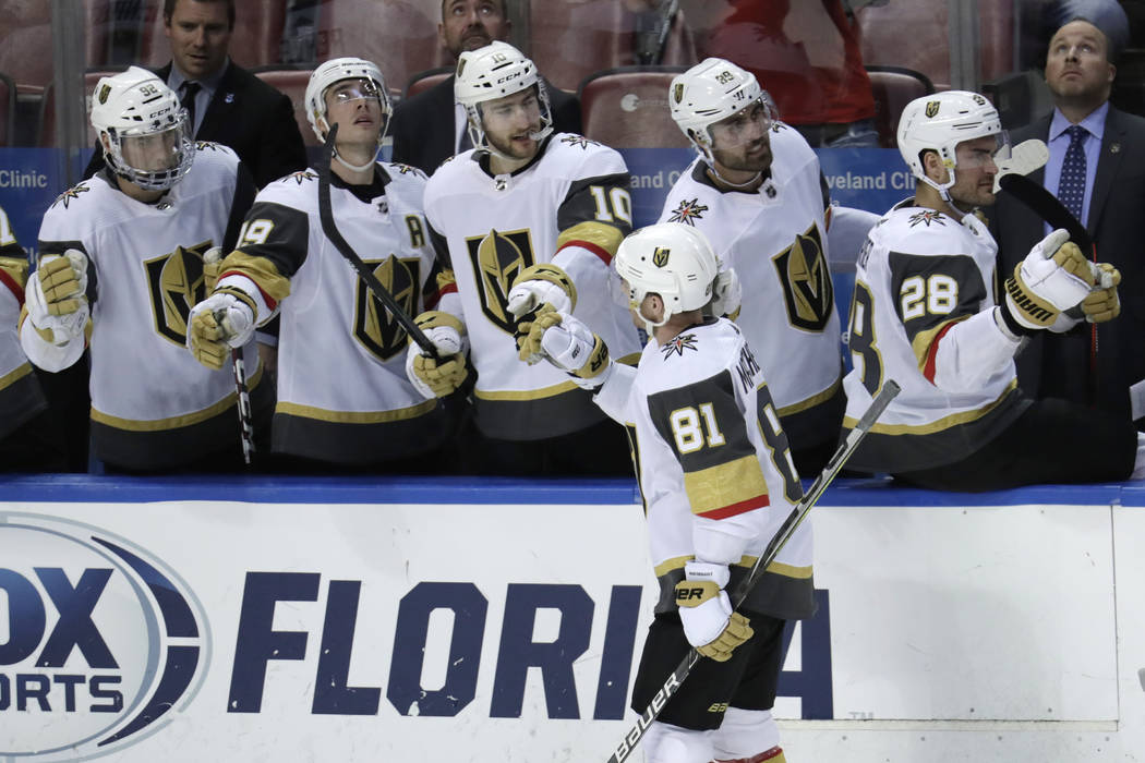 Vegas Golden Knights center Jonathan Marchessault (81) is congratulated after scoring a goal du ...