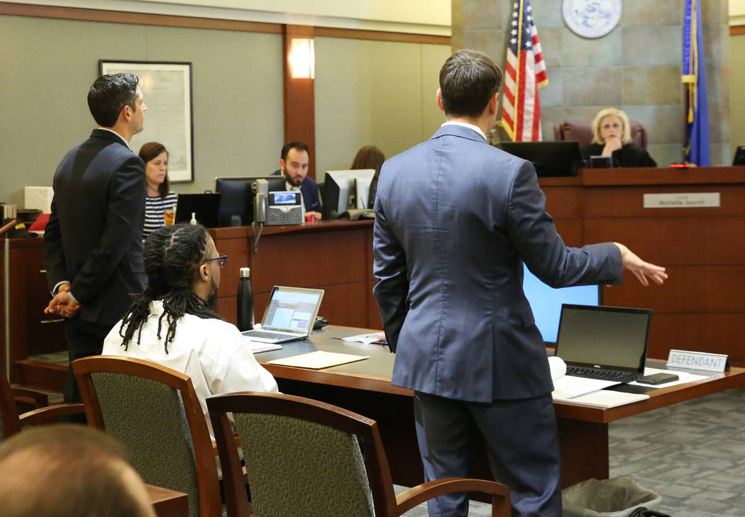 Josh Tomsheck, right, attorney for Ray Charles Brown, seated, who was found guilty for fatally ...