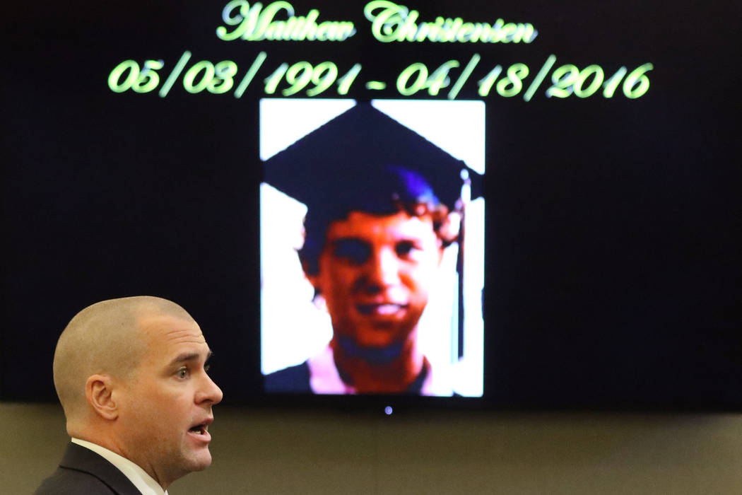 Robbery shooting victim Matthew Christensen's photograph is displayed as prosecutor John Giorda ...