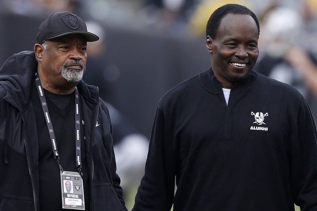 Former Oakland Raiders players George Atkinson, left, and Lester Hayes are shown before an NFL ...