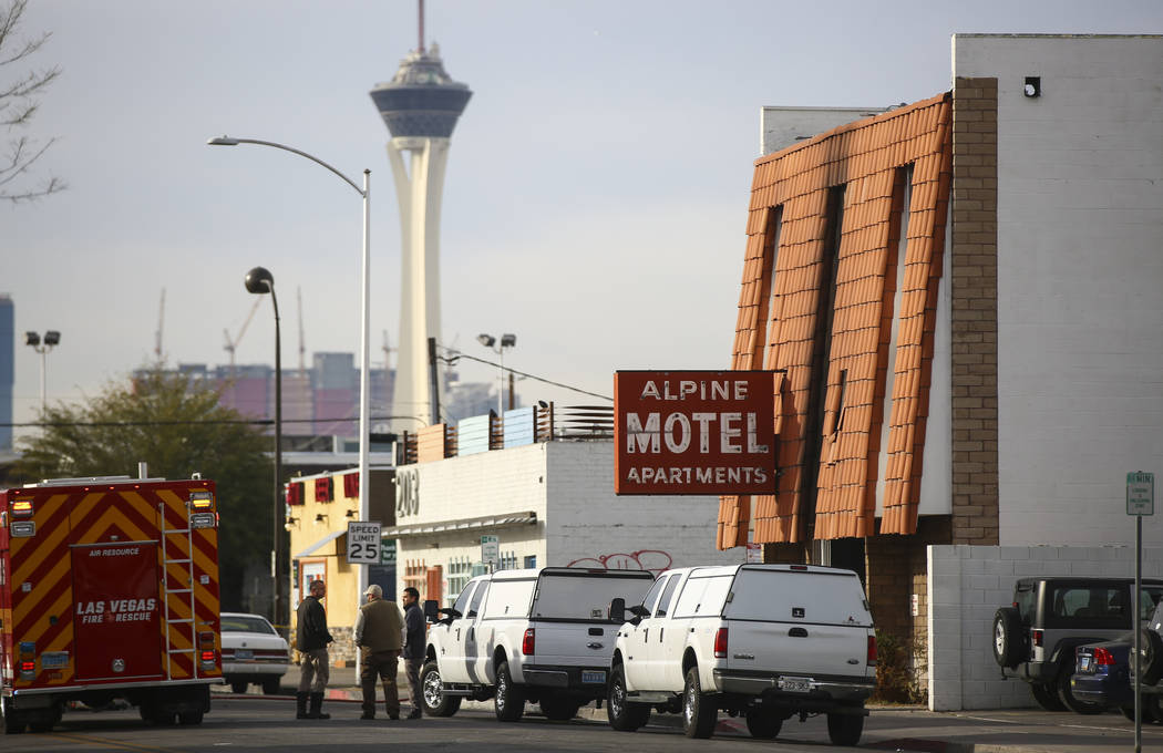 Las Vegas firefighters respond to the scene of a fire at the Alpine Apartment Motel in downtown ...