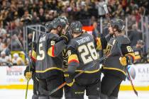 The Vegas Golden Knights celebrate a goal against the Pittsburgh Penguins during the second per ...