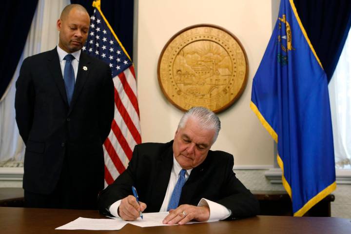 Nevada Gov. Steve Sisolak, right. (Cathleen Allison/Las Vegas Review-Journal)