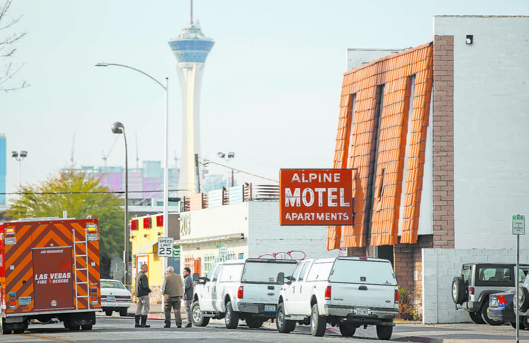 Las Vegas firefighters respond to the scene of a fire at the Alpine Apartment Motel that left 6 ...