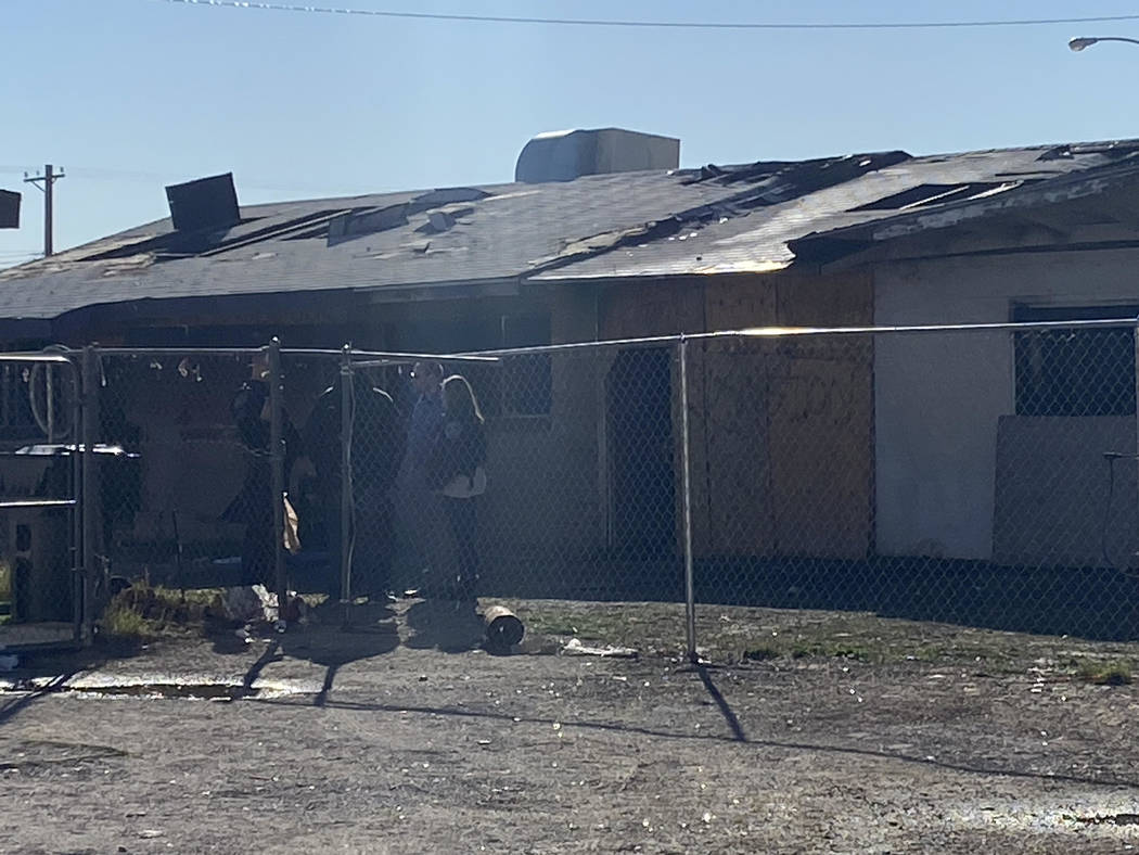 Fire inspectors at the scene of a fatal fire on Friday, Feb. 7, 2020, at 2511 McCarran St. in N ...