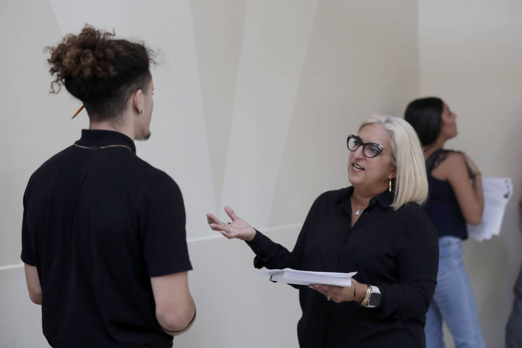 In a Oct. 1, 2019, file photo, Gory Rodriguez, of Starbucks, right, interviews a job applicant ...