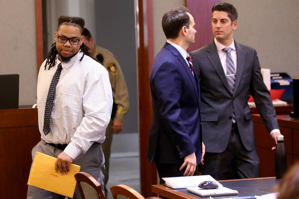 Ray Charles Brown, left, arrives in the courtroom with his attorneys, Richard Tanasi, right, an ...
