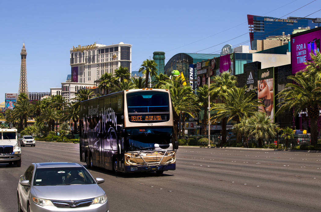 An RTC bus passes the New York-New York driving down the Strip on Tuesday, Aug. 13, 2019, in La ...