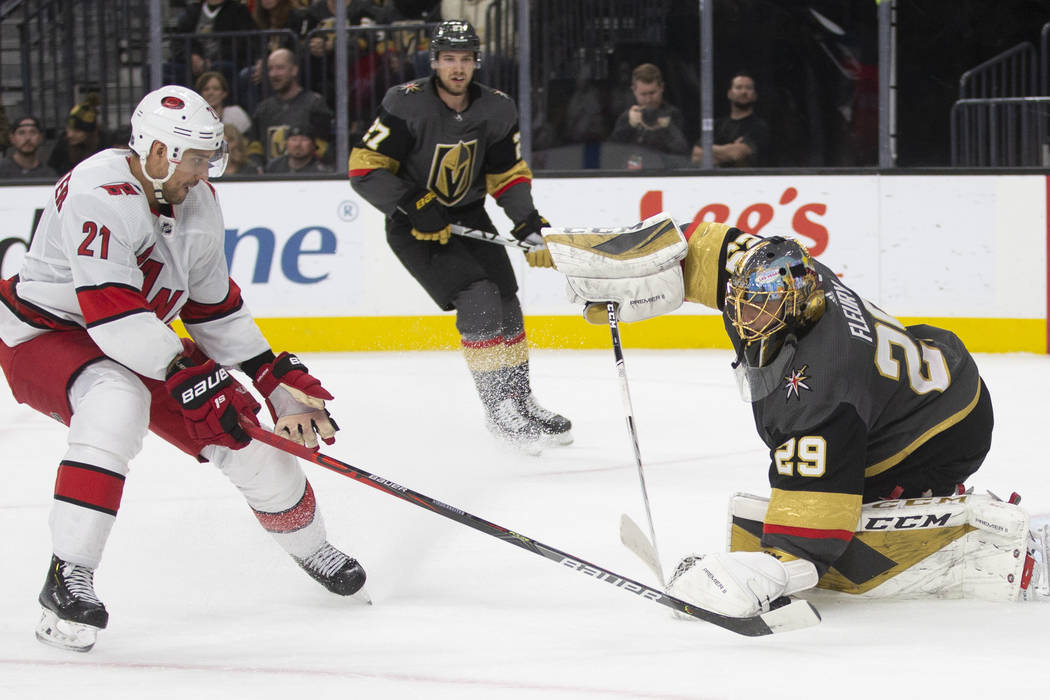 Vegas Golden Knights goaltender Marc-Andre Fleury (29) makes a save against Carolina Hurricanes ...