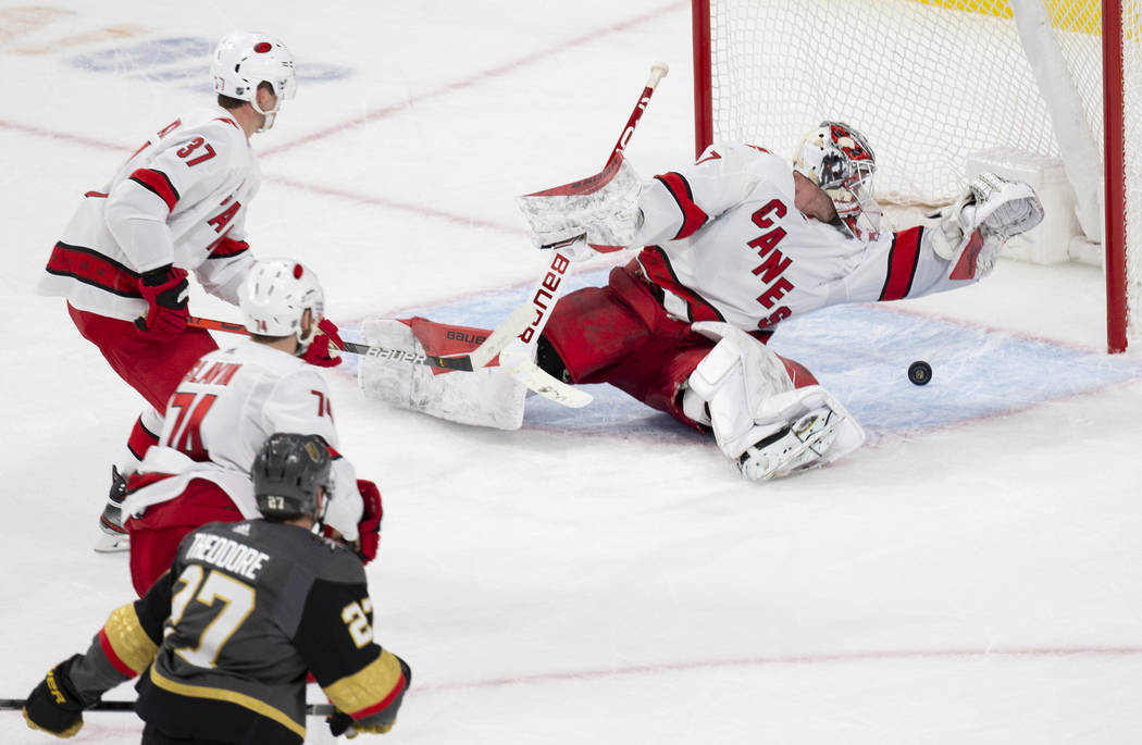 Carolina Hurricanes goaltender James Reimer (47) makes a diving save against Vegas Golden Knigh ...