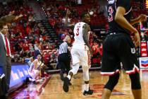 UNLV's guard Amauri Hardy (3) celebrates after scoring a three-pointer against Fresno State dur ...