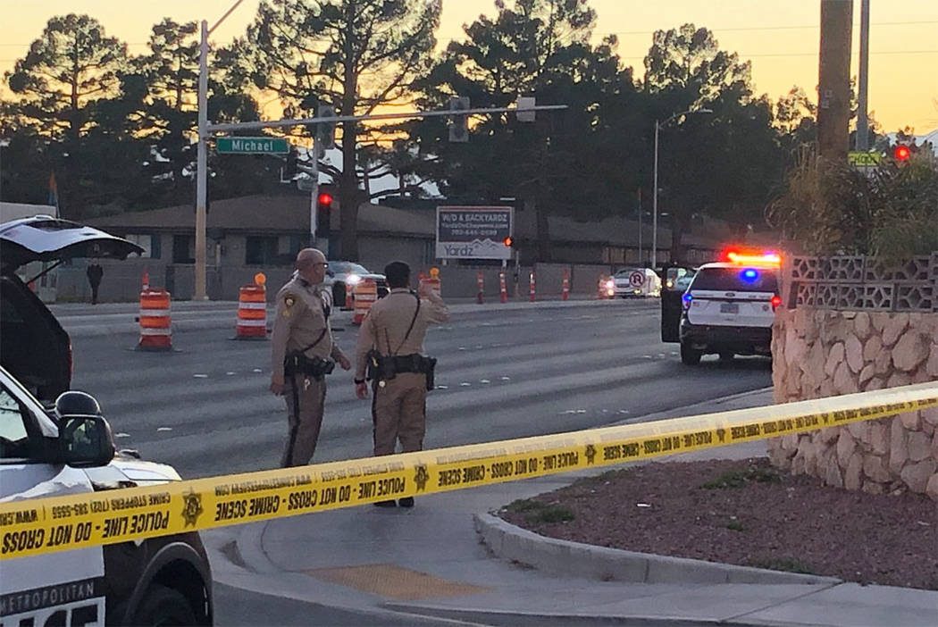 Police investigate a shooting near Cheyenne Avenue and Michael Way on Saturday, Feb. 8, 2019. ( ...