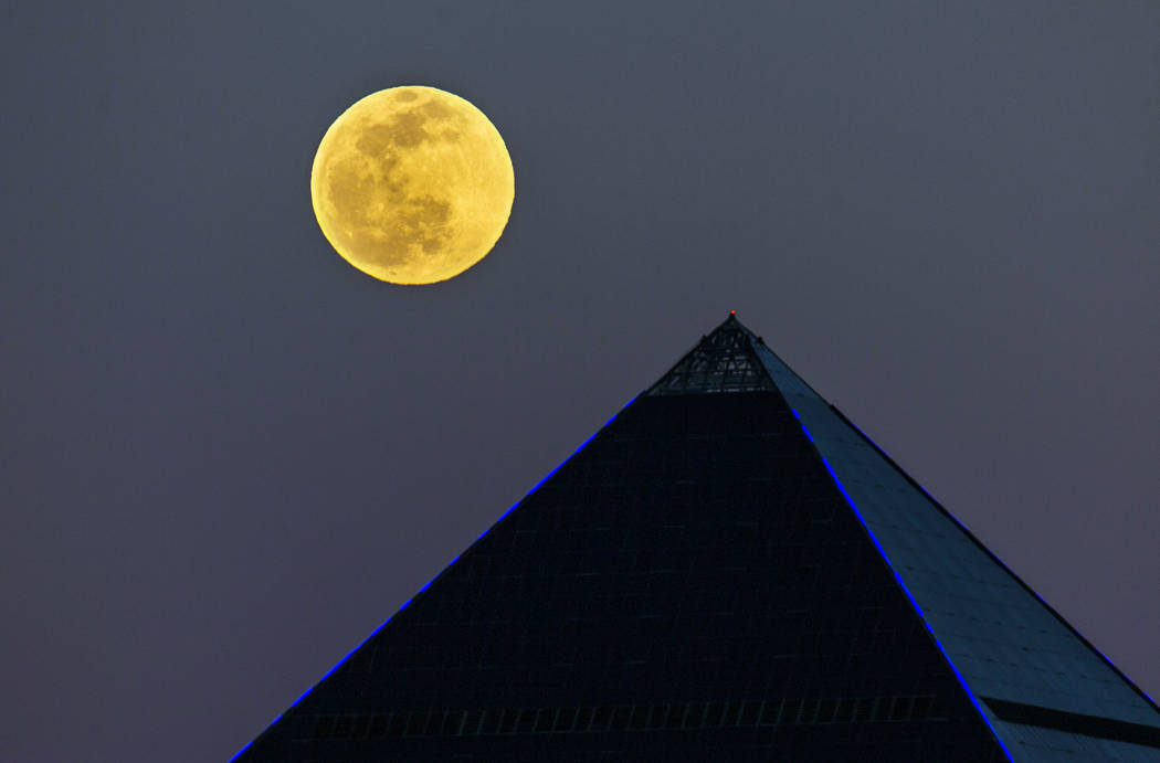 The Snow Moon rises above the Luxor on Saturday, Feb. 8, 2020, in Las Vegas. (L.E. Baskow/Las V ...