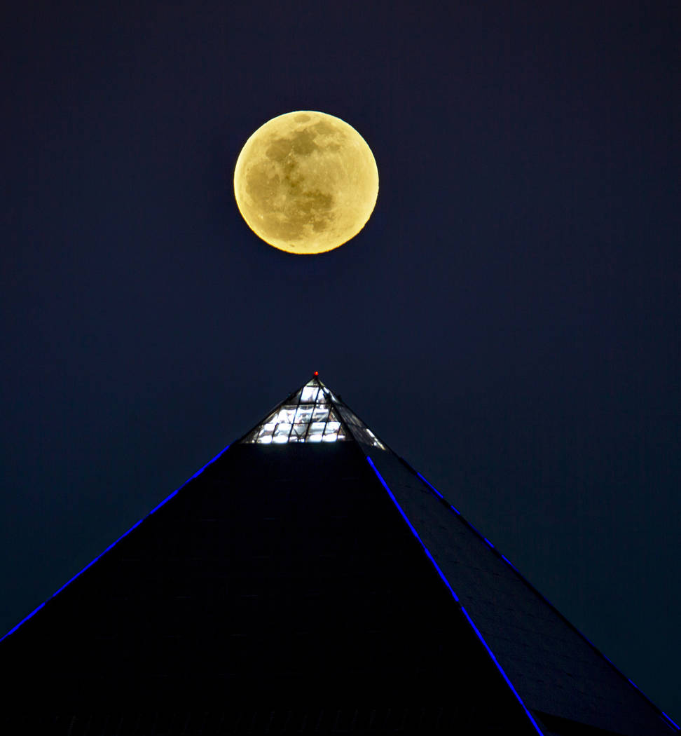 The Snow Moon rises above the Luxor on Saturday, Feb. 8, 2020, in Las Vegas. (L.E. Baskow/Las V ...