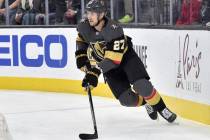 Vegas Golden Knights defenseman Shea Theodore (27) skates against the Carolina Hurricanes durin ...