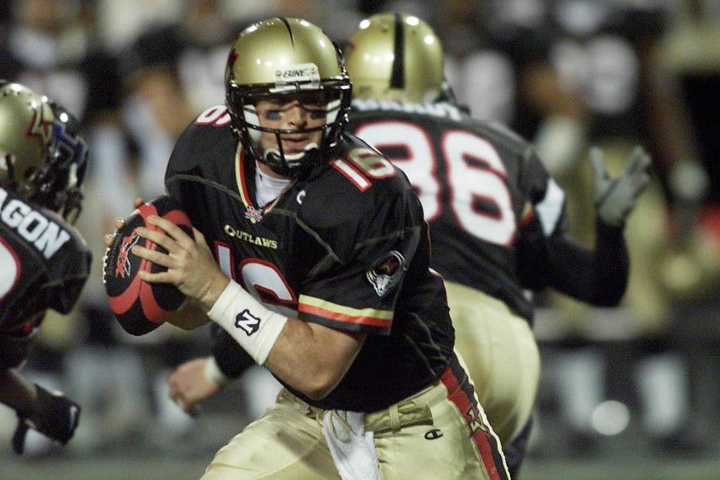 Las Vegas Outlaws quarterback Ryan Clement goes back to pass during the XFL opener against the ...