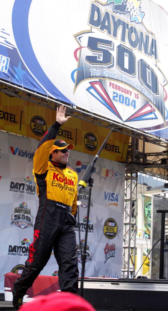 Las Vegan Brendan Gaughan waves to the crowd during driver introductions before competing in hi ...