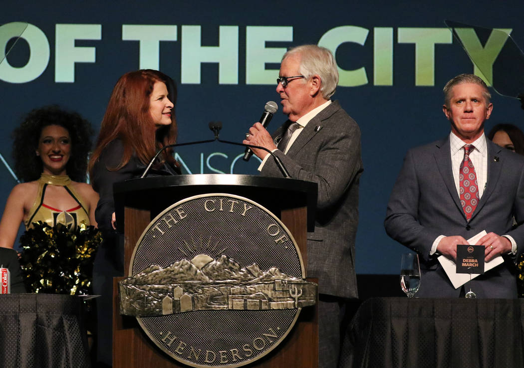 Henderson Mayor Debra March, left, listens as Golden Knights owner Bill Foley speaks as team pr ...