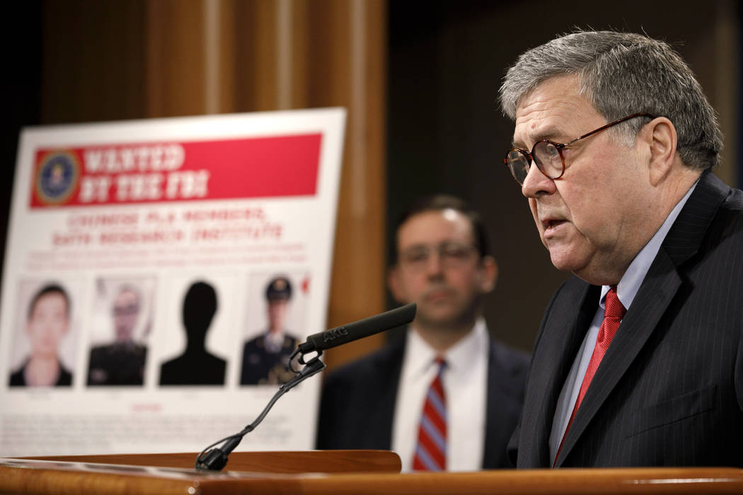 Attorney General William Barr speaks during a news conference, Monday, Feb. 10, 2020, at the Ju ...