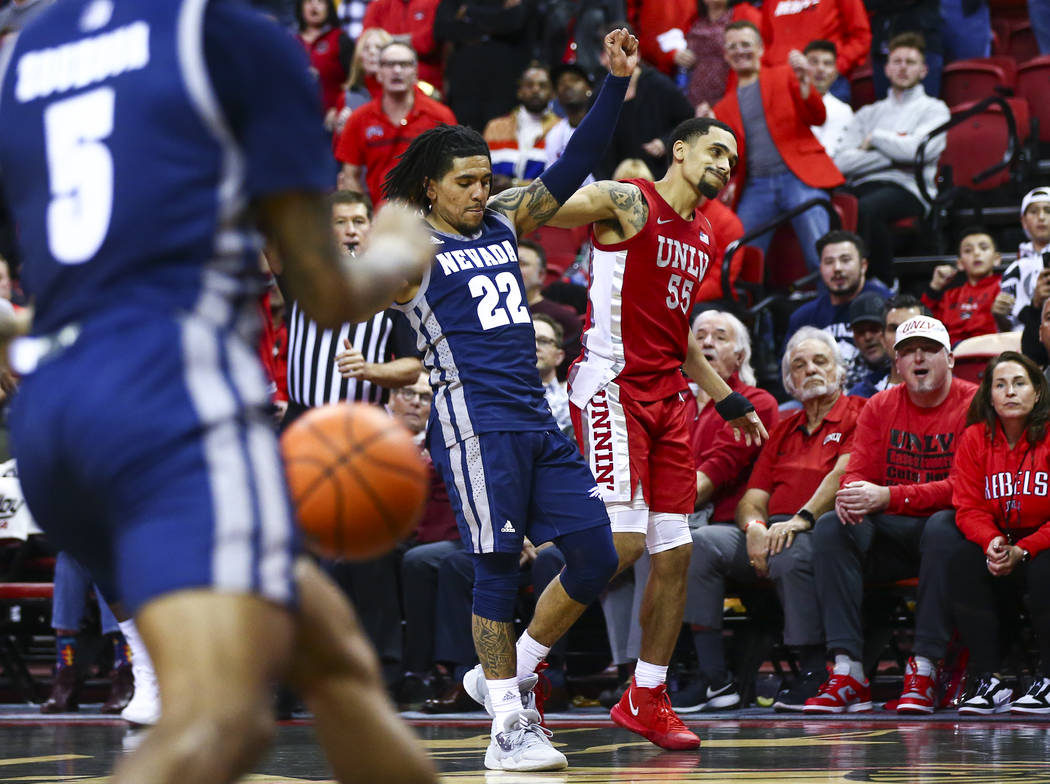 UNLV's Elijah Mitrou-Long (55) reacts after his shot comes short at the end of overtime as UNR' ...