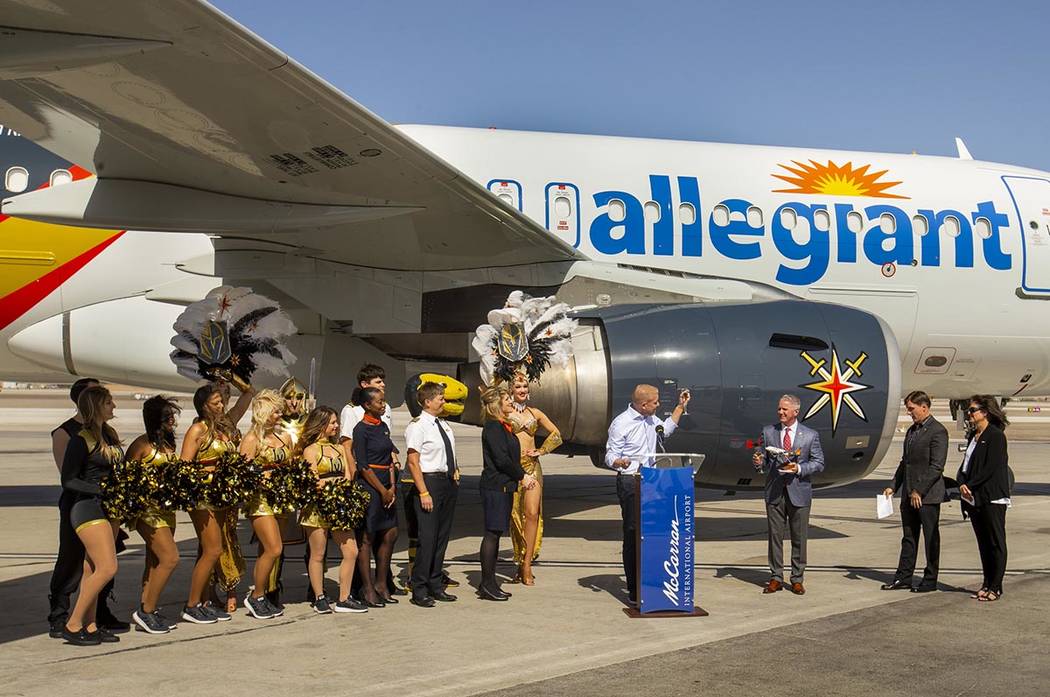 Allegiant CMO Scott DeAngelo offers a toast as Allegiant unveils a new Golden Knights-themed pl ...