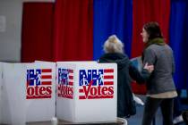 Residents arrive to vote in the New Hampshire primary at Bishop O'Neill Youth Center, Tuesday, ...