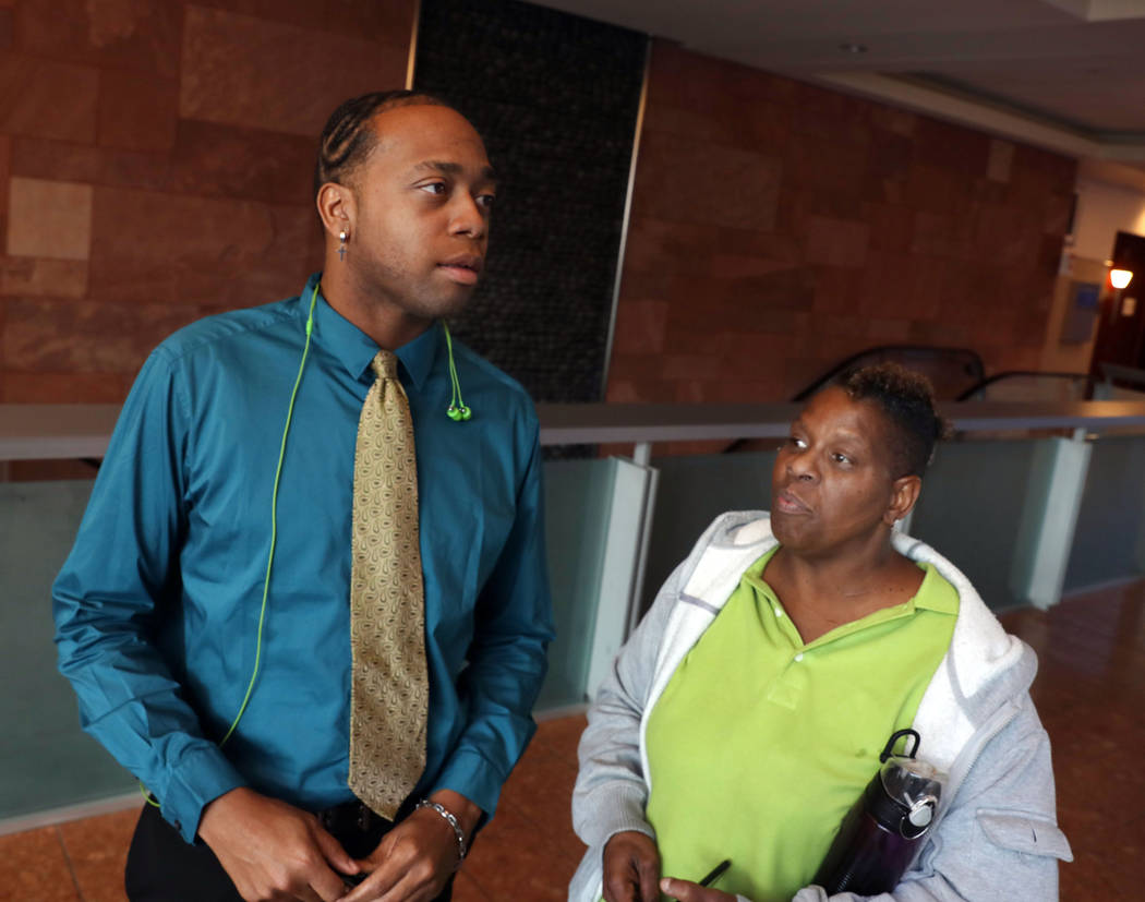 Displaced Alpine Motel Apartments tenants Timothy Henry, left, and Audrey Palmer stand outside ...