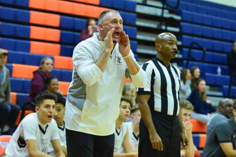 Faith Lutheran head coach Bret Walter shouts to his team during a game between Liberty High Sch ...